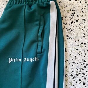 Palm Angels Green Track Pants with White strips.